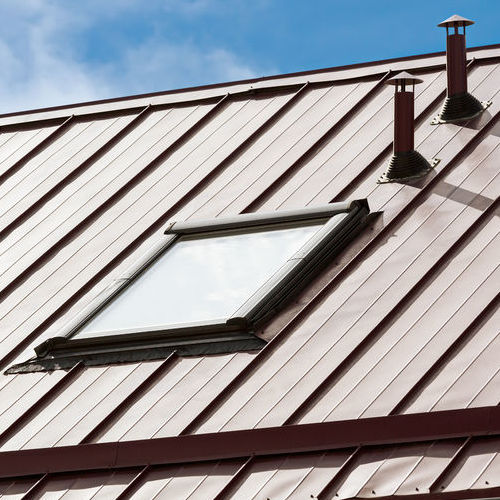 beige metal roof with skylight